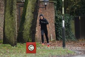 Harry Styles - EXCLUSIVE The rain did not put off One Directions' Harry Styles from going for a run. He...
