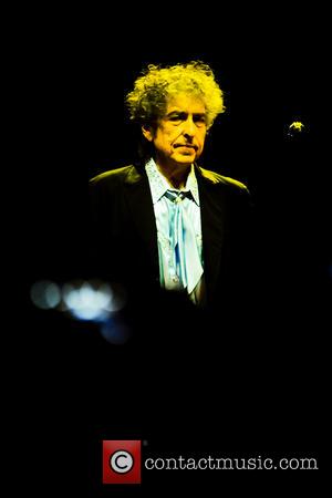 Bob Dylan Picks Up Nobel Prize Medal - He Was In Town Anyway
