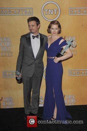 Amy Adams and Jeremy Renner - 20th Annual Screen Actors Guild Awards - Press Room - Los Angeles, California, United...