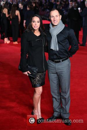 Beth Tweddle and Lukasz Rozycki - 'Jack Ryan: Shadow Recruit' UK premiere at Vue cinema - Red Carpet Arrivals -...