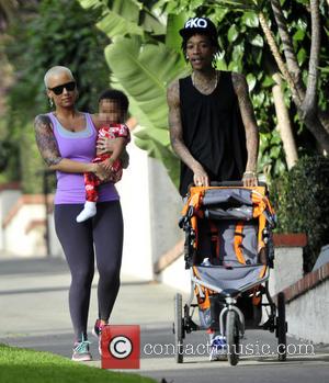 amber rose and Wiz Khalifa - American rapper Wiz Khalifa takes his wife and son Sebastian on a hike to...