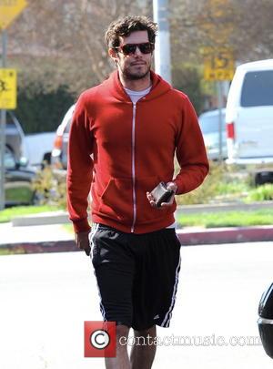 Adam Brody - Newly married Adam Brody is all smiles after seeing a chiropractor in Studio City. The actor was...