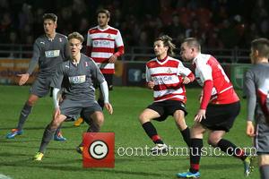 Louis Tomlinson - One Direction's Louis Tomlinson makes his Doncaster Rovers football debut at Keepmoat Stadium - Doncaster, United Kingdom...