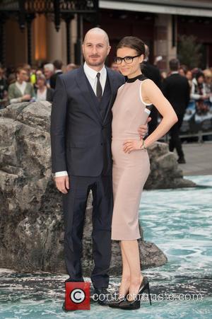 Darren Aronofsky and Guest - 'Noah' UK Premiere held at the Odeon Leicester Square - Arrivals. - London, United Kingdom...