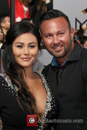 Jenni 'Jwoww' Farley and Roger Mathews - 23rd Annual MTV Movie Awards at the Nokia Theatre - Arrivals - Los...