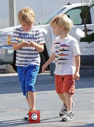 Oliver Phillips and Gustav Phillips - Julie Bowen and her three sons spotted eating pizza for lunch at a farmers'...