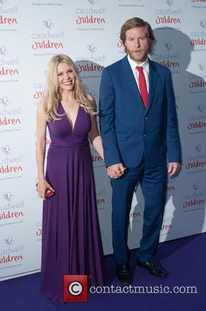 Melinda Messenger and Guest - The 2014 Caudwell Butterfly Ball held at Grosvenor House - Arrivals. - London, United Kingdom...