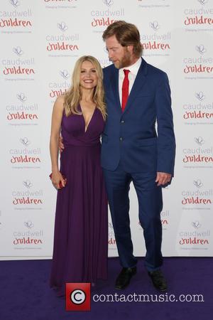 Melinda Messenger and Warren Smith - Caudwell Children Butterfly Ball 2014 held at the Grosvenor Hotel - Arrivals - London,...