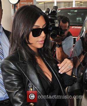 Kim Kardashian's Paris Arrival Kicks Off Wedding Countdown