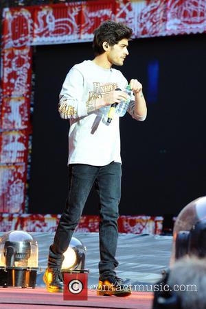 One Direction and Zayn Jawaad Malik - One Direction performing live in concert during their 'Where We Are' tour at...
