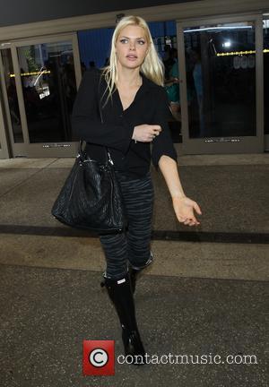 Sophie Monk - Sophie Monk arrives at Los Angeles International (LAX) airport - Los Angeles, California, United States - Thursday...