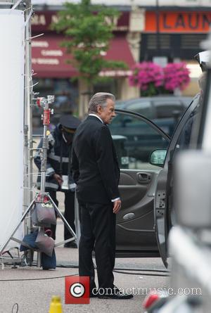 Harvey Keitel - Harvey Keitel's car is investigated by a parking enforcement officer while filming a commercial in North London....