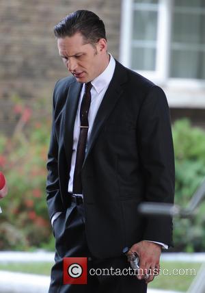 Tom Hardy - Tom Hardy and Emily Browning on the set of the film 'Legend' in East London - London,...