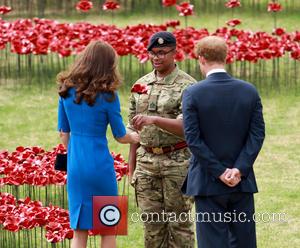 Catherine Duchess of Cambridge, Kate Middleton and Prince Harry - Princes William and Harry, accompanied by Catherine Duchess of Cambridge...