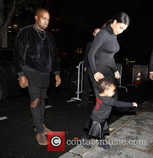 Kim Kardashian Tackled At Paris Fashion Week By Red Carpet Prankster 