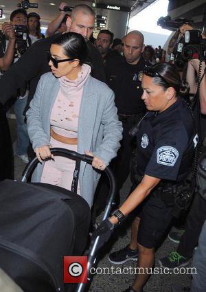 Kim Kardashian Denies 'Abandoning' North West At Paris Hotel
