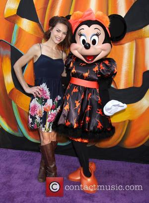 Rebecca Herbst and Minnie Mouse - A variety of stars and their children attended the Disney VIP Halloween event at...