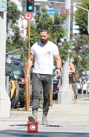 Shia LaBeouf sports a beard and military boots out on La Brea Avenue - Los Angeles, California, United States -...