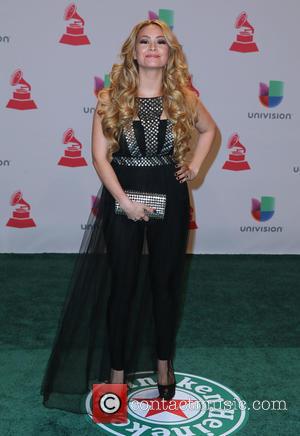 T Lopez - A host of celebrities were snapped as they took to the green carpet for the 2014 Latin...