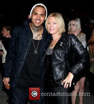 Chris Brown and Karen Bystedt - Exclusive serigraph signing benefiting Symphonic Love Foundation at Guerilla Atelier clothing store - Los...