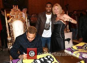 Chris Brown, Trey Songz and Karen Bystedt - Chris Brown and Karen Bystedt Exclusive Serigraph Signing Benefit Symphonic Love Foundation...