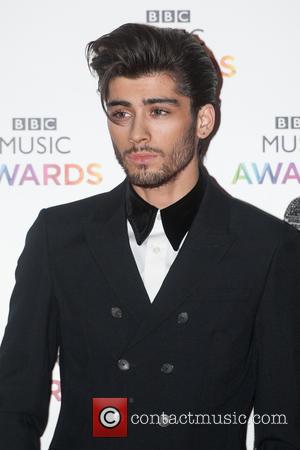 Zayn Malik "Signed Off With Stress", Taking A Break From One Direction Tour