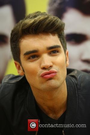 Josh Cuthbert - Union J sign copies of their new album 'You Got It All' at Morrison supermarket at Morrisons...