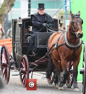 Martin Freeman - Benedict Cumberbatch and Martin Freeman film a scene for the 'Sherlock' christmas special in London - London,...