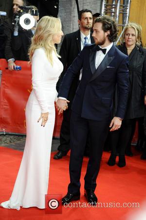 Sam Taylor-Johnson and Aaron Taylor-Johnson - Stars from the upcoming raunchy movie 'Fifty Shades of Grey' were photographed on the...