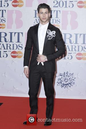 Nick Jonas - A variety of stars from the music industry were photographed as they arrived at the Brit Awards...