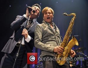 Tony Hadley and Steve Norman - Shots of British new wave band Spandau Ballet as they performed live in concert...