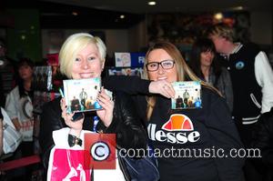 Blue sign copies of their new album 'Colours' at HMV in Birmingham at HMV Bullring Shopping Centre - Birmingham, United...