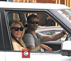 Gretchen Rossi and Slade Smiley - Gretchen Rossi being driven by her husband heading for a shopping spree in Beverly...