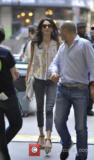 Amal Clooney - Amal Clooney visits her husband George Clooney on the set of 'Money Monsters' - Manhattan, New York,...