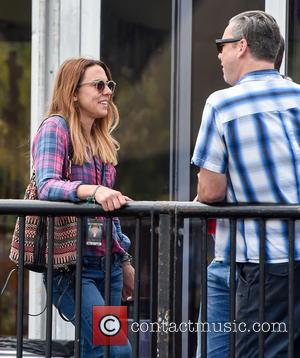 Mel C - Mel C relaxes at the Isle of Wight Festival with a pint at Isle of Wight Festival...