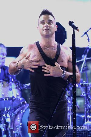 Robbie Williams Battling Injuries On Tour