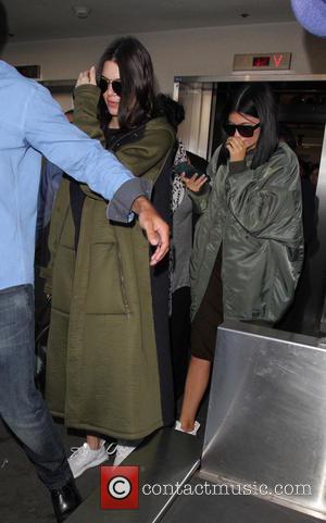 Kendall Jenner , Kylie Jenner - Kendall and Kylie Jenner at Los Angeles International Airport (LAX) - Los Angeles, California,...