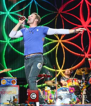 "I'd Have To Take You For Dinner First!" Chris Martin Gets Propositioned By Fan During Coldplay Gig 