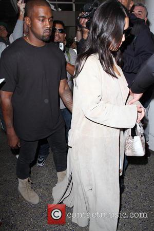 Kim Kardashian Responds To Photoshop Rumours With Behind The Scenes M.I.L.F. $ Photos
