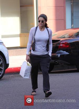 Michelle Rodriguez is all smiles after she treats herself with a visit to Anastasia Beverly Hills beauty store in Beverly...