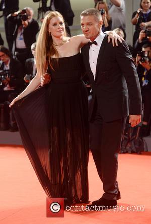 Amy Adams and Jeremy Renner