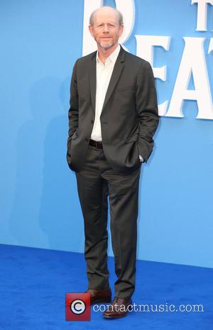 Ron Howard poses alone and with Brian Grazer at the 'The Beatles: Eight Days a Week' World Premiere held at...