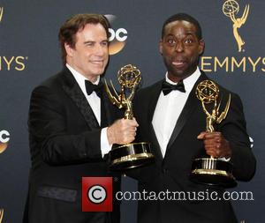 John Travolta and Sterling K. Brown