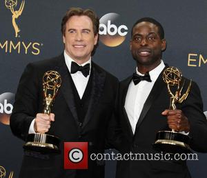 John Travolta and Sterling K. Brown