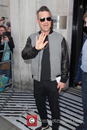 Robbie Williams seen outside BBC Radio 2 at BBC Western House, London, United Kingdom - Friday 30th September 2016