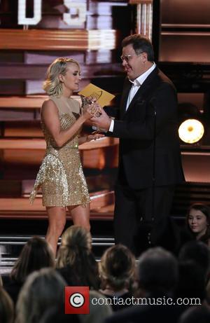 Carrie Underwood and Vince Gill