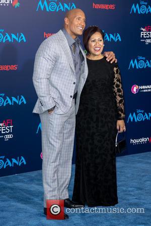 Dwayne Johnson and Lauren Hashian seen attending the premiere of Disney's 'Moana,' during AFI FEST 2016 presented by Audi, held...