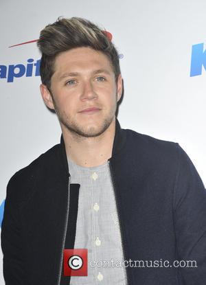 Niall Horan seen arriving at 102.7 KIIS FM's 2016 Jingle Ball - Los Angeles, California, United States - Saturday 3rd...