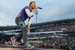 Coldplay, Chris Martin, Jonny Buckland, Will Champion and Chris Martin at Ullevi Stadium