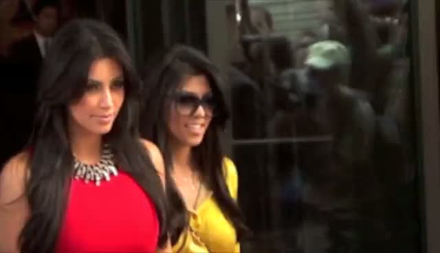 Sisters Kourtney and Kim Kardashian filming in New York